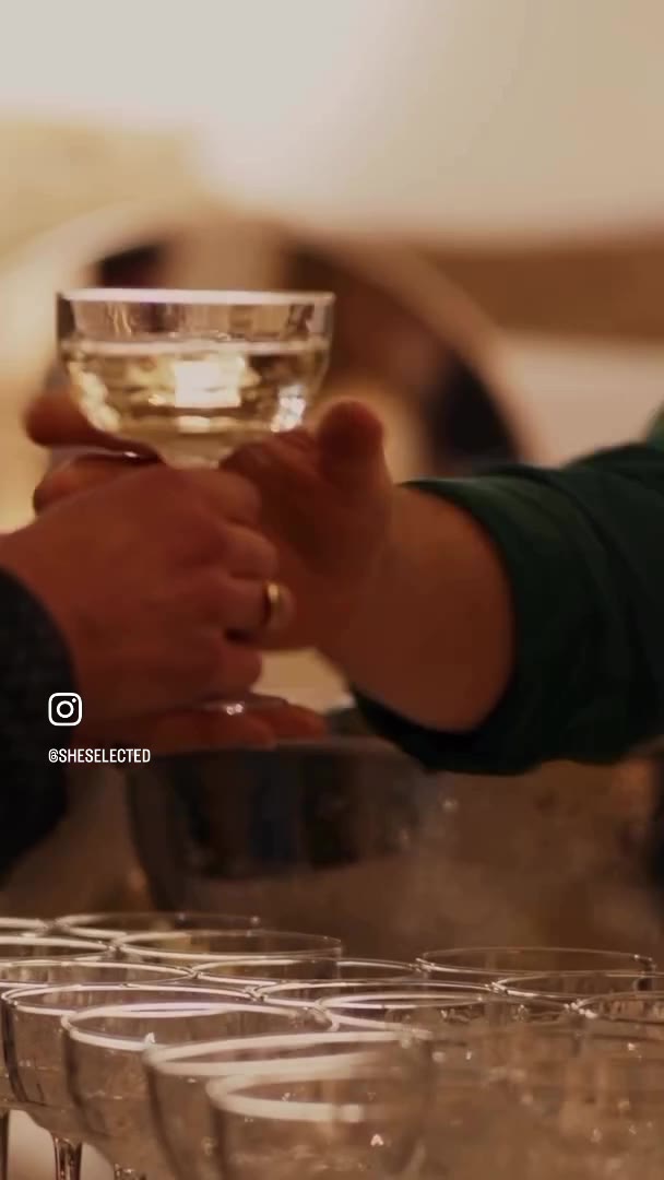 She Selected 5 year event — champagne coupe being served